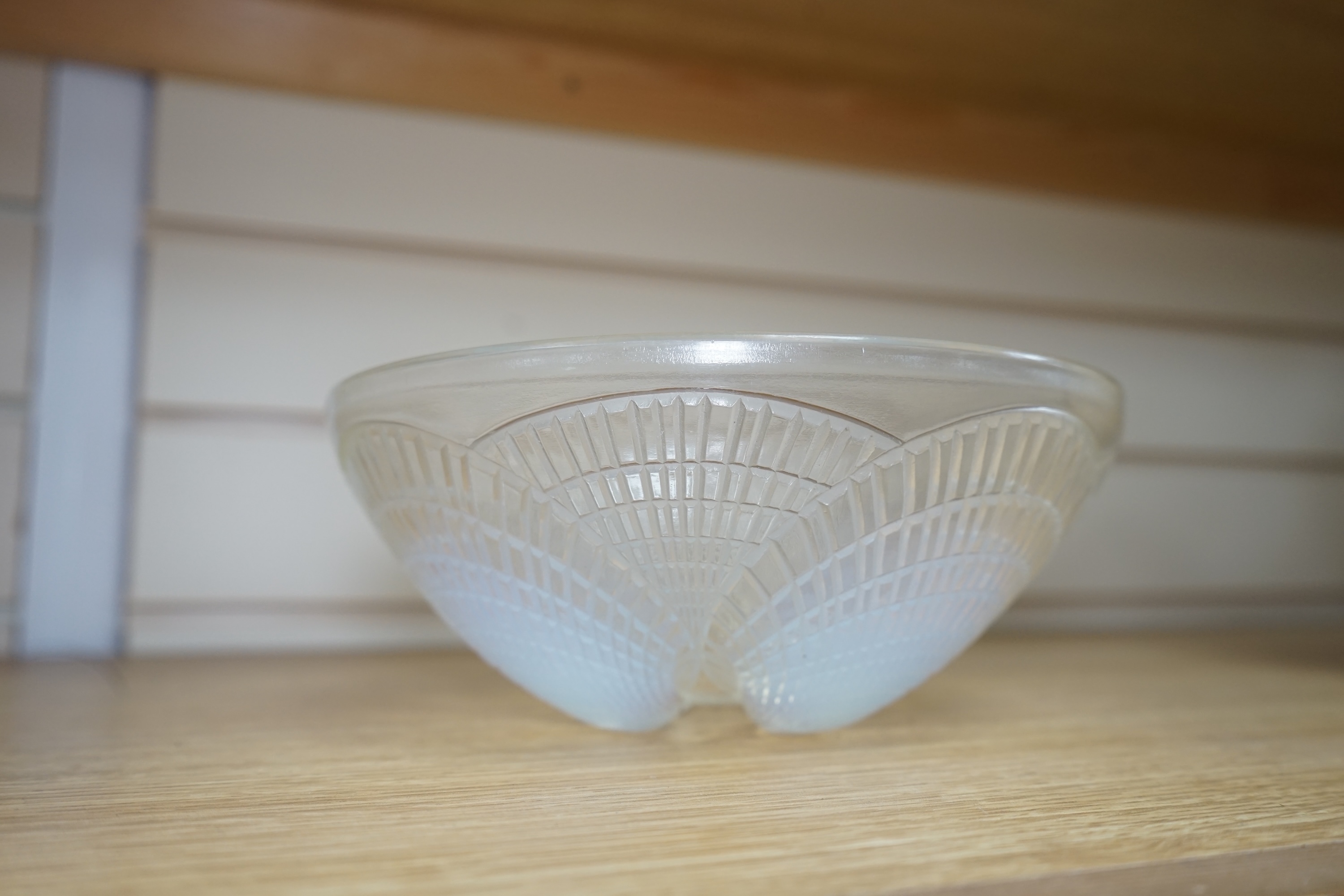 An R. Lalique coquille pattern glass bowl, no.3201, 21cm diameter. Condition - wear to base as expected, otherwise good